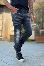 XAGON MAN JEANS CON ABRASIONI E SPLASH COLORE GRIGIO