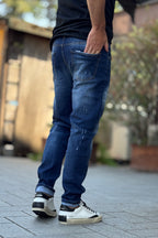 XAGON MAN JEANS CON ABRASIONI E SPLASH