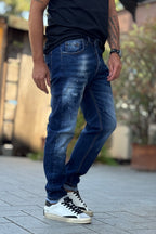 XAGON MAN JEANS CON ABRASIONI E SPLASH