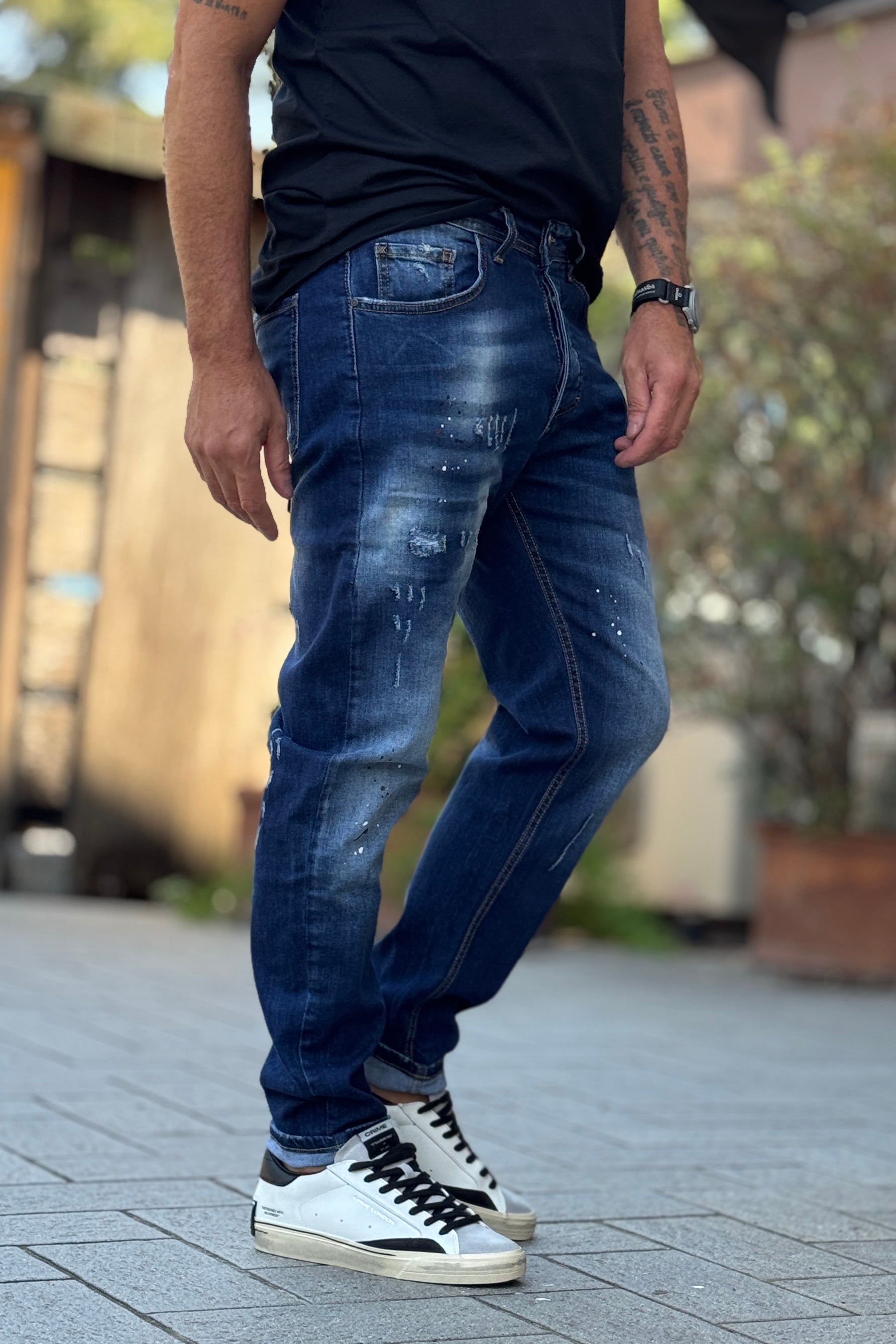 XAGON MAN JEANS CON ABRASIONI E SPLASH