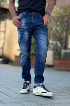 XAGON MAN JEANS CON ABRASIONI E SPLASH