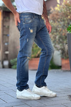 TELAMIRA JEANS CON ABRASIONI E ROTTURE