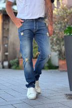 TELAMIRA JEANS CON ABRASIONI E ROTTURE