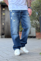727 JEANS CON ROTTURE E ABRASIONI